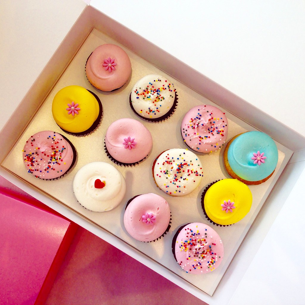 cupcakes with sprinkles in box